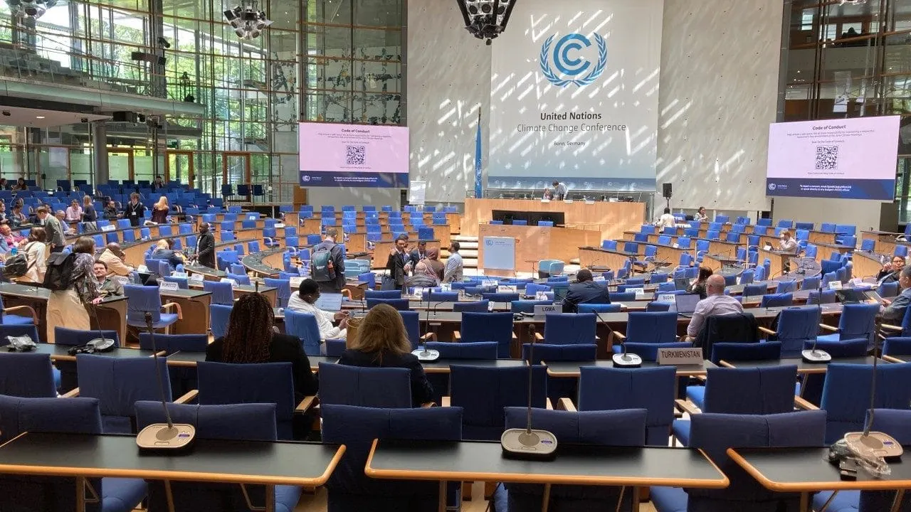 Delegates seated in the plenary hall of the UN Climate Change Conference in Bonn, Germany, during the SB64 sessions