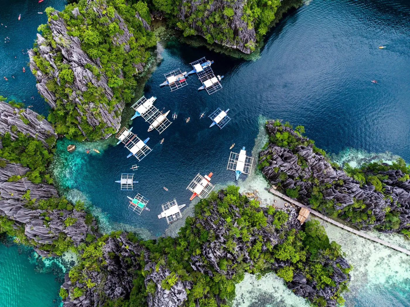 Boats in a coastal lagoon in El Nido, Palawan, the Philippines